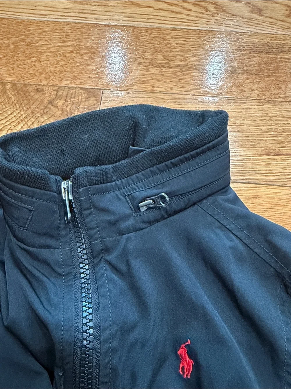 Ralph Lauren Black Jacket with Red Polo Logo, optional hoodie.